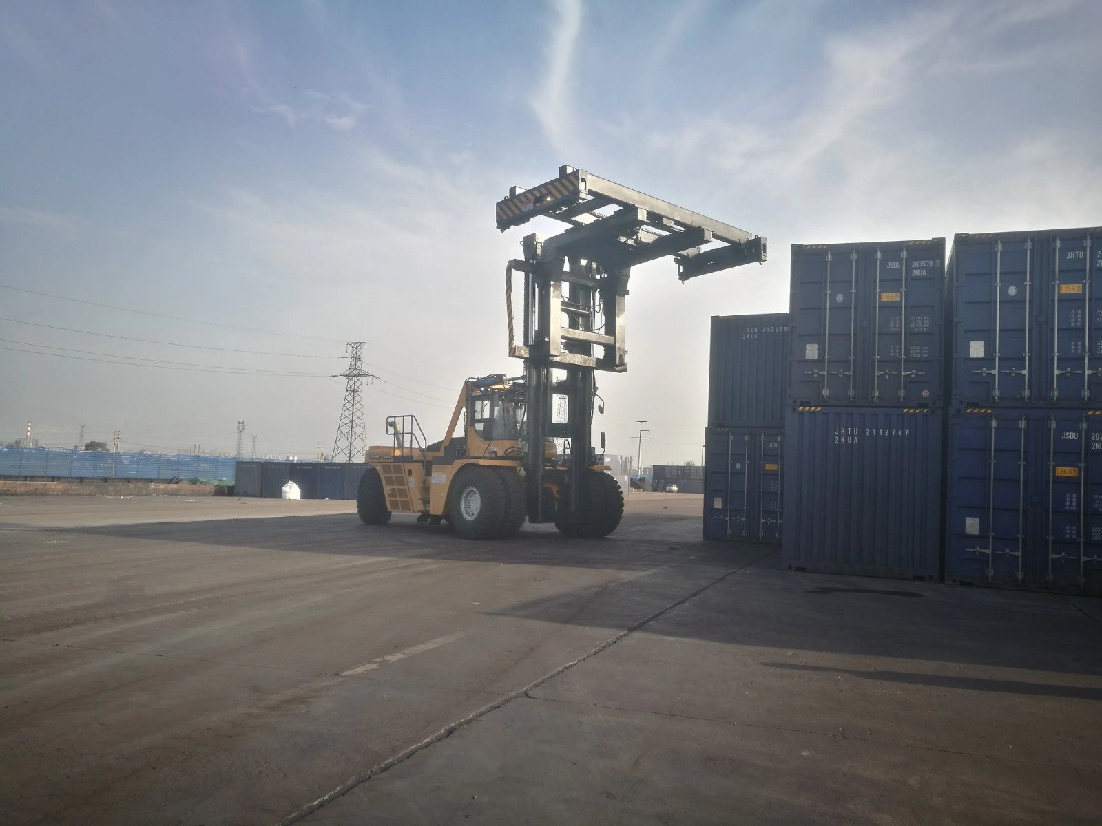 Container handling equipment in a port environment